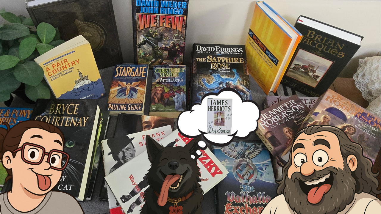 A table full of the latest may 2025 book additions with caricatures of Jennifer and ryan and Jojo sticking out their tongue